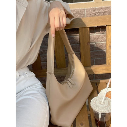 レディース用ソフトトートバッグ レトロシンプルファッション シングルショルダー 餃子バッグ ニッチデザイン 大容量 通勤用